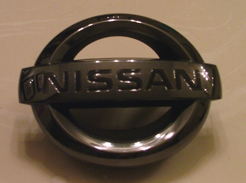 Black chrome nissan emblems #7