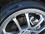 I curbed my front right wheel.  Can I fix it myself?? (pics attached)-img_2155.jpg