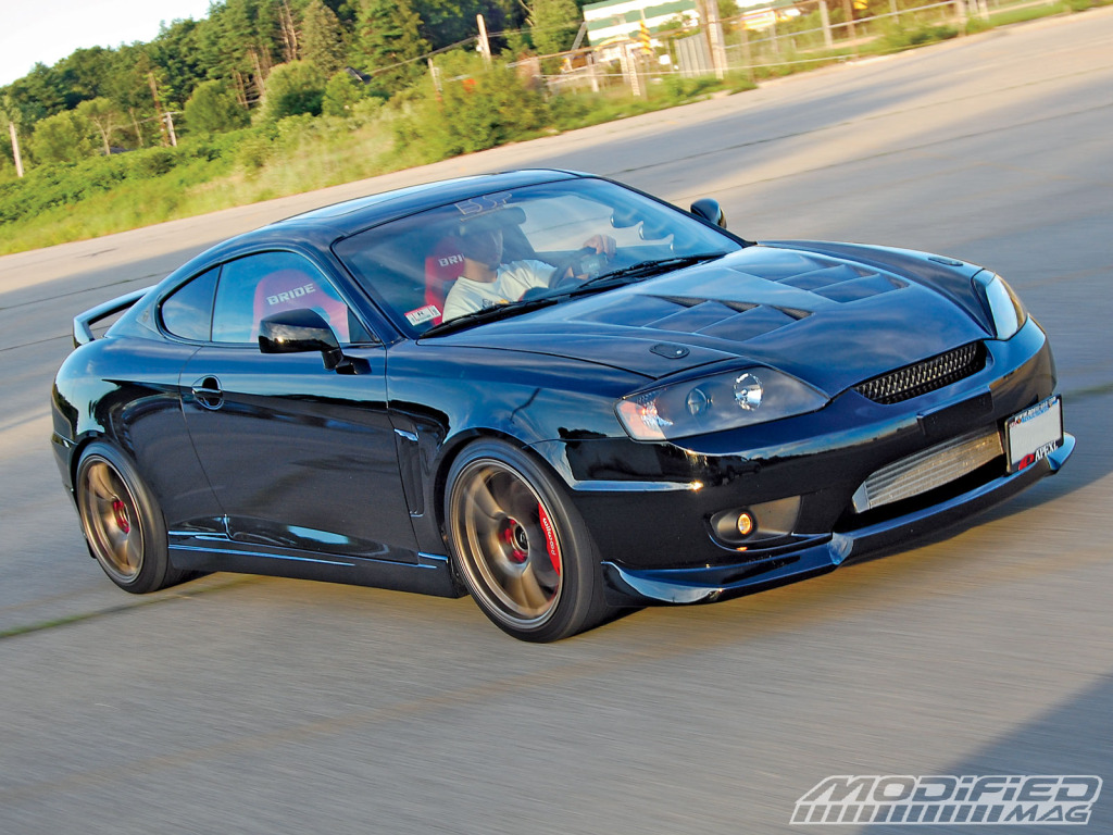 Name:  modp_0910_05_o2003_hyundai_tiburon_gtfront_view.jpg
Views: 944
Size:  271.1 KB