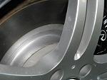 OK whats with this....does anyone have this rotor rust? is it due to brake pads?-img_0122a.jpg