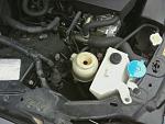 Help! Just got car back from autoshop and it's missing this cover!?-capless.jpg