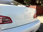 Holes behind rear emblem-photo.jpg