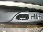 Just a heads up on the rubberized part on the steering wheel.-door-handle-3.jpg