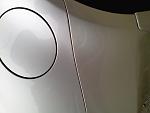 Someone hit my rear bumper, had it replaced, new paint looked good, now looks darker?-1.jpg
