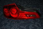 06 coupe driver tail light with button, cracked-g35-tail-light-1.jpg