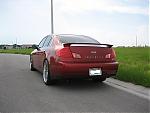 03-06 Sedan Garnet Fire Pics-new-wheel-rear-driver-quarter2.jpg