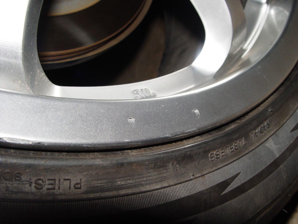 tire place gouged my rim. refinish wheel? pics of damage ...
